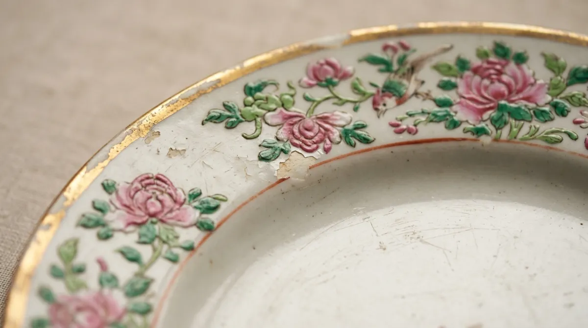 Close-up of worn overglaze enamel and gilding