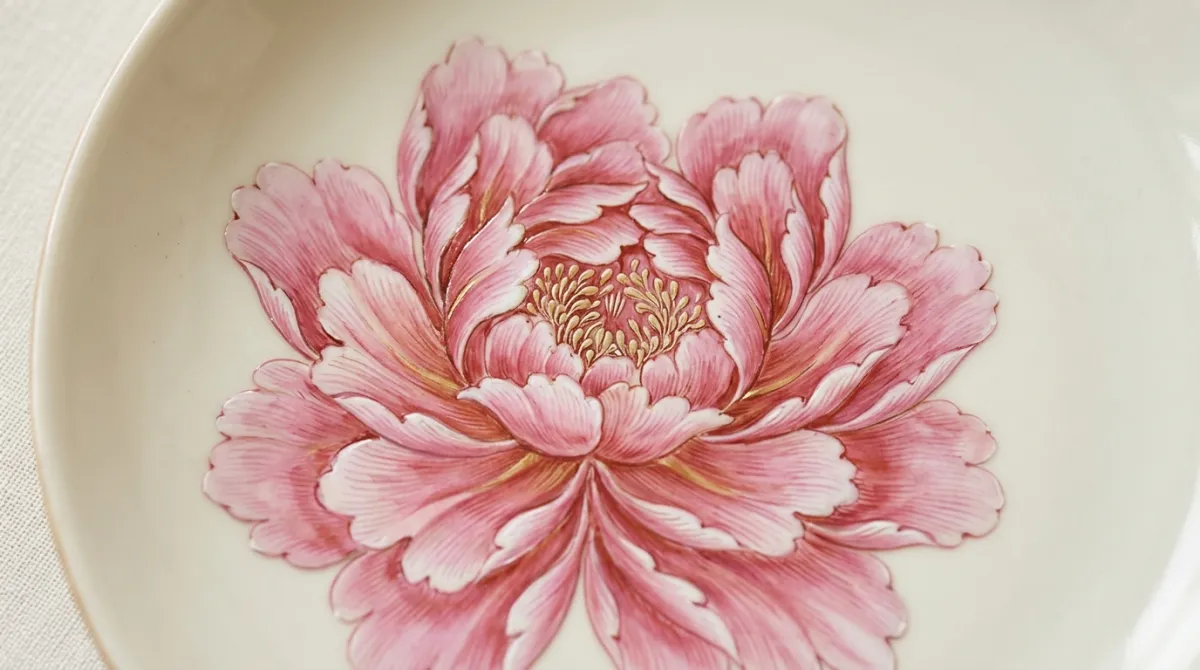 Macro of a hand-painted peony on Chinese porcelain